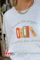 Lost In The Pages Long Sleeve Graphic Sweatshirt - Be You Boutique