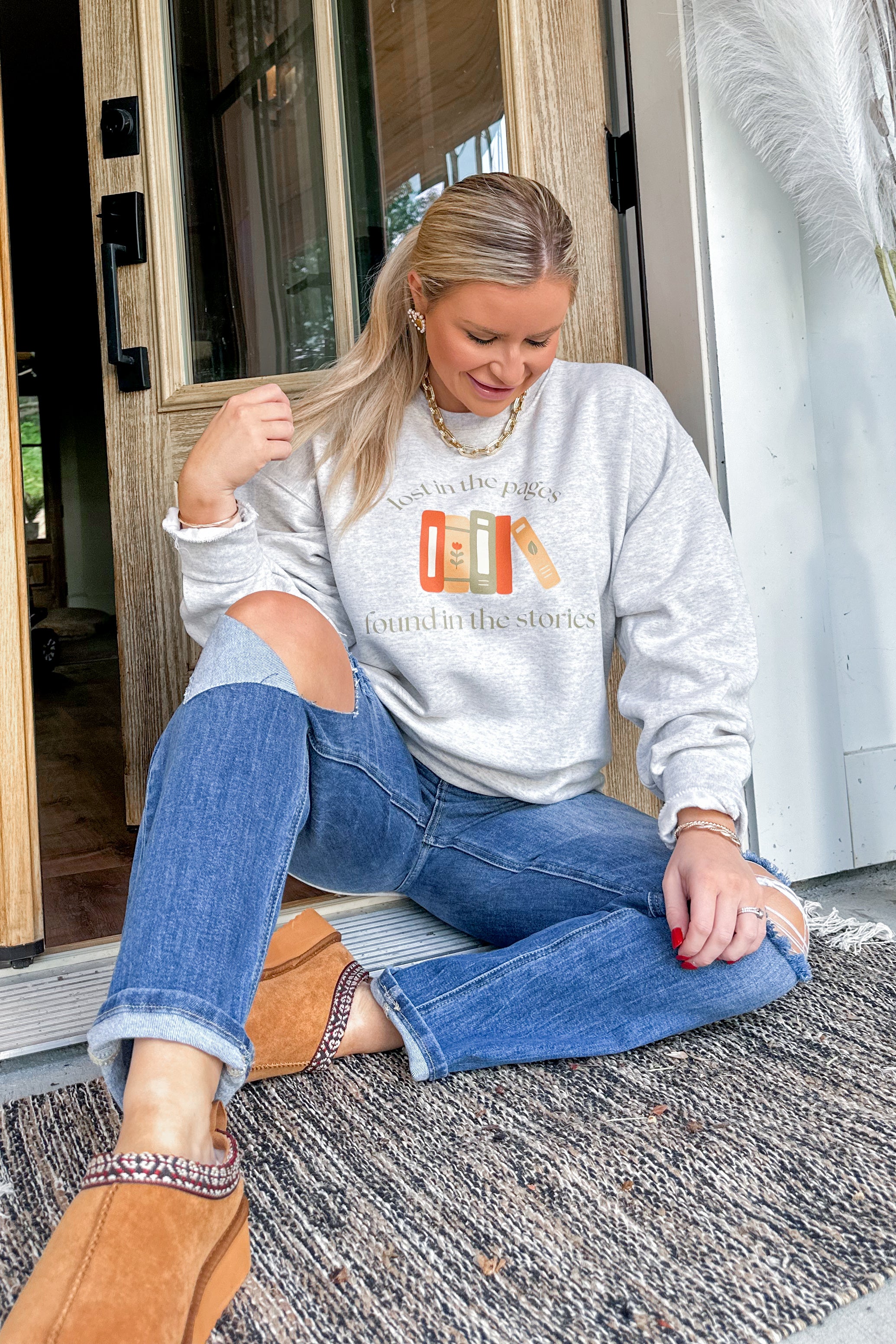 Lost In The Pages Long Sleeve Graphic Sweatshirt - Be You Boutique