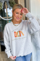 Lost In The Pages Long Sleeve Graphic Sweatshirt - Be You Boutique