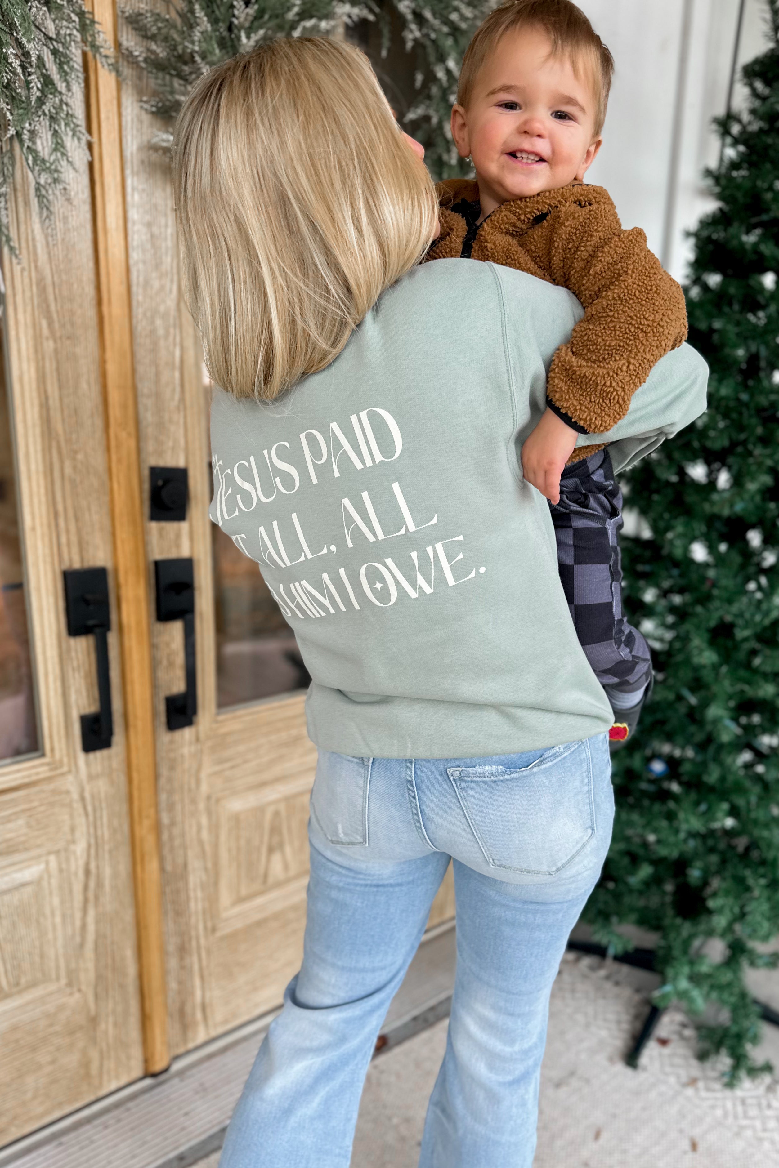 Oliver & Otis Christmas "Jesus Paid It All" Long Sleeve Crew Neck Graphic Sweatshirt - Be You Boutique