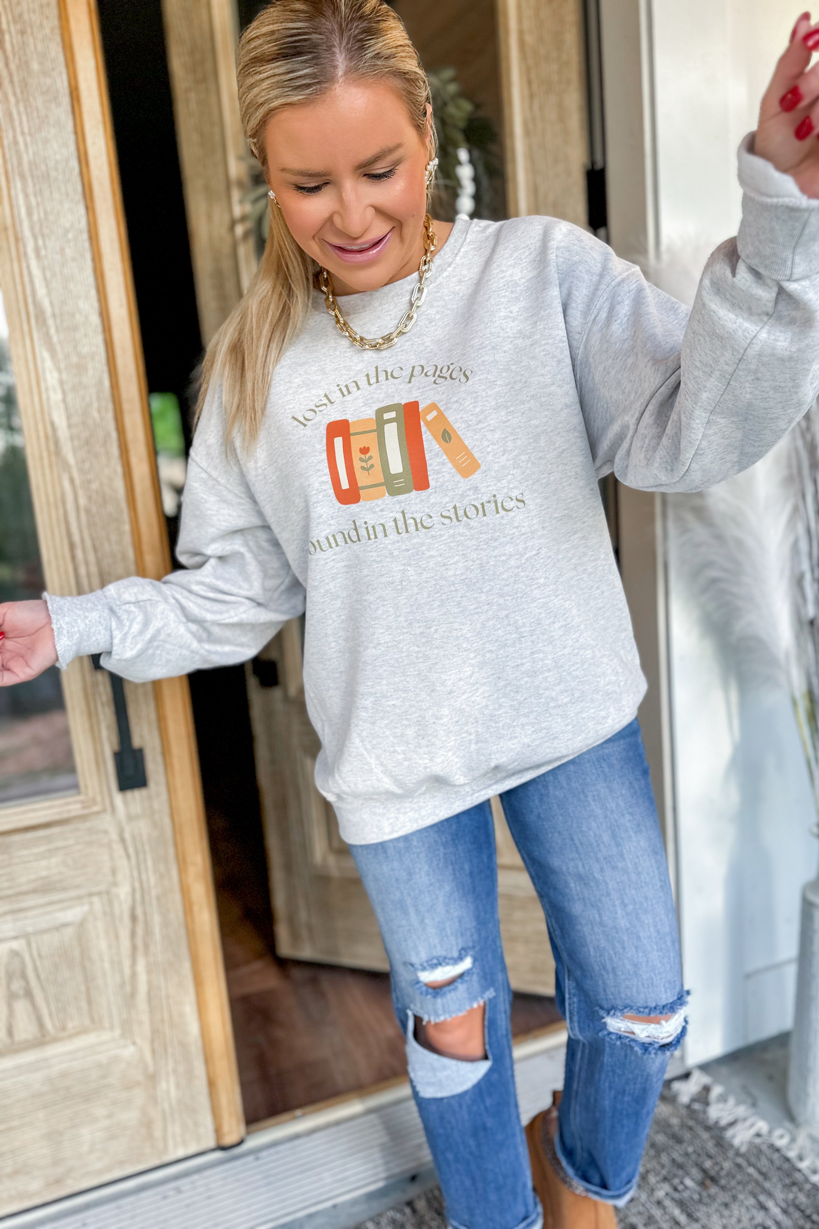 Lost In The Pages Long Sleeve Graphic Sweatshirt - Be You Boutique