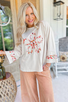 Kylie Flower Patch 3/4 Sleeve Knit Top - Be You Boutique